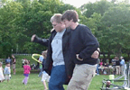 Klaus and Jim playing ring-toss with hula-hoops