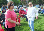 Gloria & Pat cut the lawn