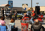 Motorcyle stops to see band